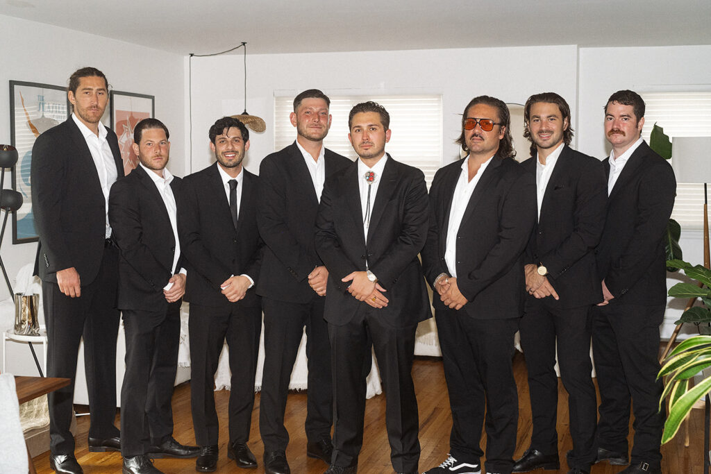 Groomsmen at their house in Rockaway Beach in New York. 