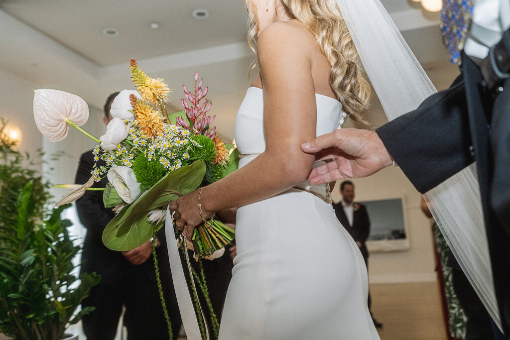 Bride walking down the isle with her dad at The Rockaway Hotel.