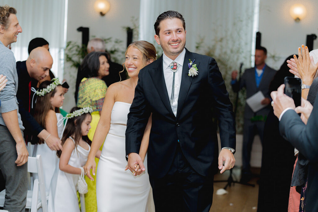 Couple after getting married at The Rockaway Hotel.