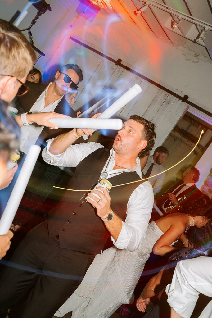 Candid dance floor moments from Trevor and Madison’s wedding reception at Blanc Denver