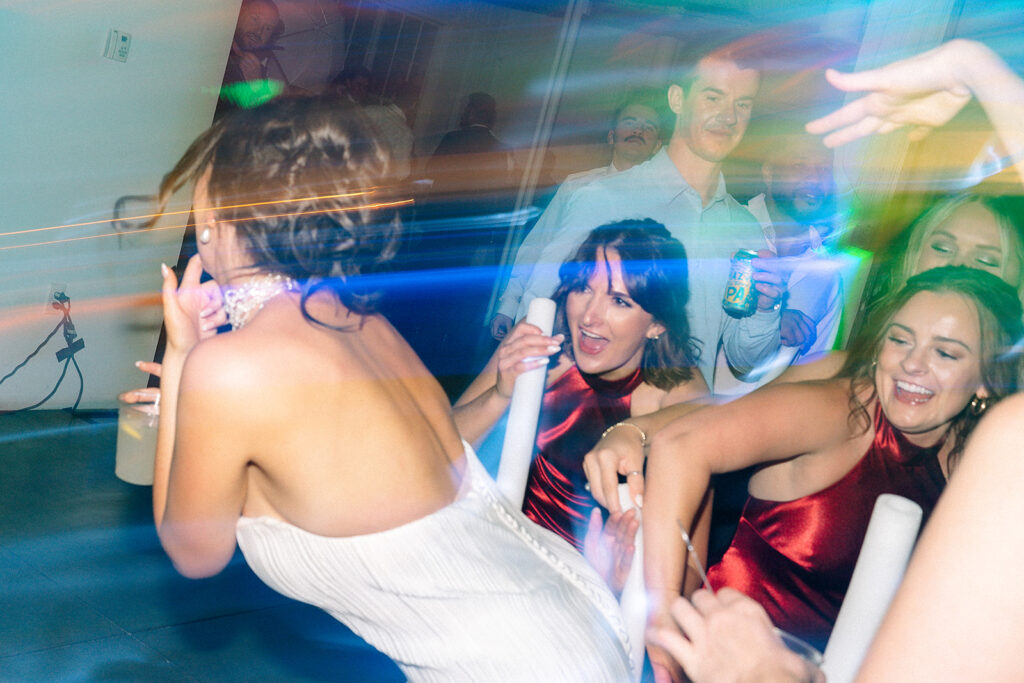 Candid dance floor moments from Trevor and Madison’s wedding reception at Blanc Denver