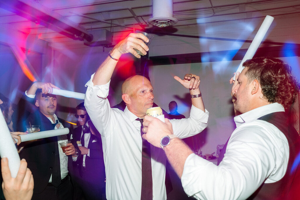 Candid dance floor moments from Trevor and Madison’s wedding reception at Blanc Denver