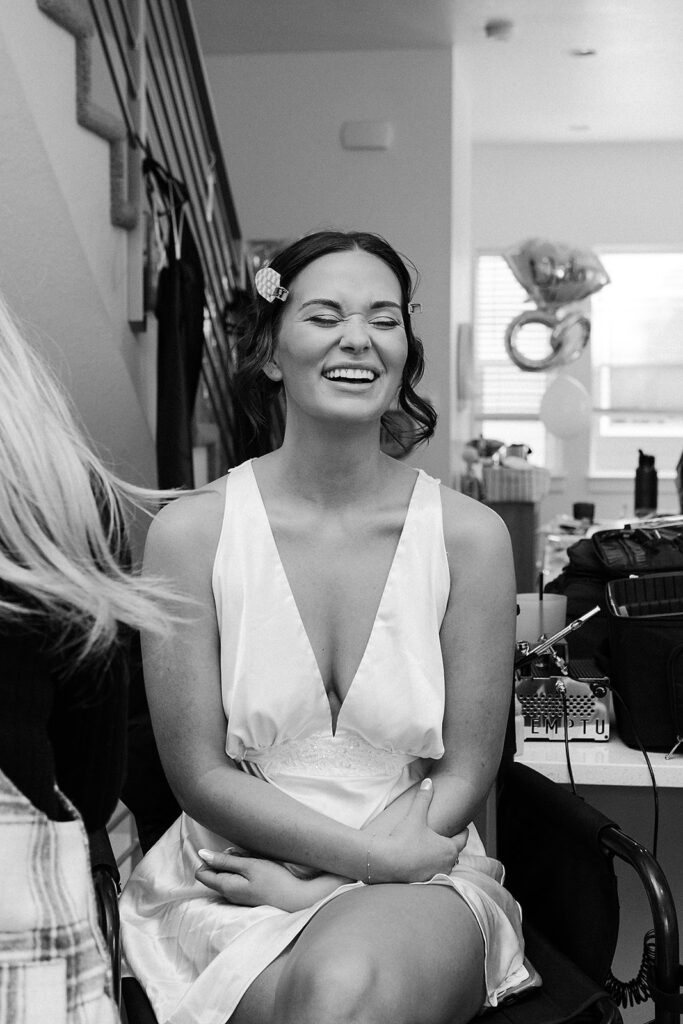 Bride is getting ready at her house on her wedding day